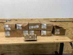 lot 98 image: ZURN Lot of 9- ZARB161-3IP 3X10 All Rough Brass Oblique Scupper Drains