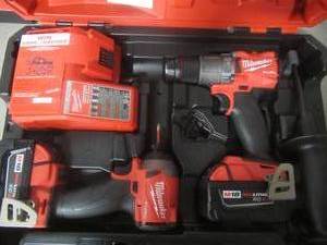 lot 288 image: MILWAUKEE M18 FUEL 18V Lithium-Ion Brushless Cordless Hammer Drill and Impact Driver Combo Kit (2-Tool) with Two 5Ah Batteries (BRAND NEW, OPEN BOX) 2997-22