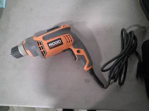 lot 289 image: RIDGID 8 Amp 38 in. Corded DrillDriver (NEW IN BOX) R70011