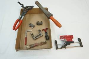 chainsaw sharpener, pipe cutters and flaring tools