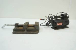 air compressor and bench vice