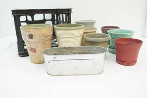 milk crate with flower pots inside