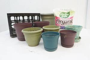 milk crate with flower pots inside