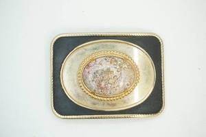 western themed belt buckle with center stone