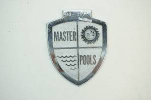 vintage Master Pools cast metal emblem