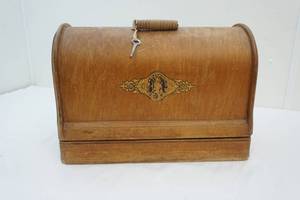 antique Singer sewing machine in wood case