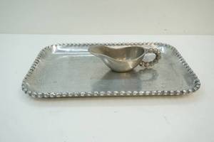 pewter serving tray and gravy bowl
