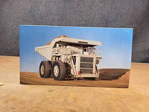 lot 143 image: Conrad Liebherr 2450 Dump Truck - 150 Scale Model