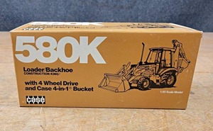 lot 158 image: CASE 580K Loader  Backhoe Diecast Model - 135 Scale Model