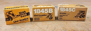 lot 164 image: Lot of (3) CASE 1845 Skidloader Diecast Models - 1845, 1845B & 1845C - 135 Scale Models