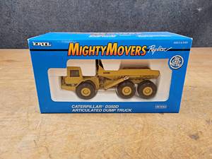 lot 182 image: ERTL Mighty Movers Caterpillar D350D Articulated Dump Truck Diecast Model - 150 Scale Model