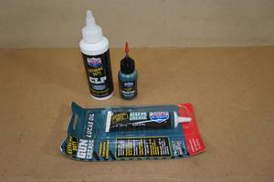 lot 32 image: Lucas Oil Extreme Duty Firearm Cleaner, Grease, and Oil