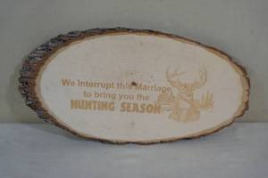 lot 147 image: Wood Slab Sign - We Interrupt This Marriage, Hunting Season