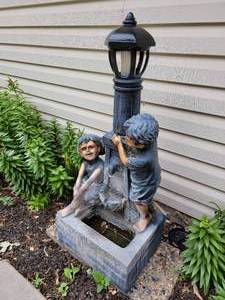 Playful Streetlamp Garden Fountain