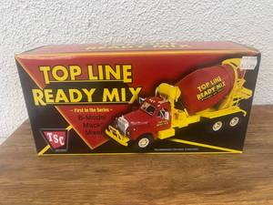 lot 142 image: TSC Top Line Ready Mix B-Model Mack Mixer