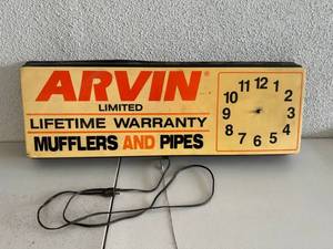 lot 278 image: Arvin Mufflers & Pipes Light Up Clock