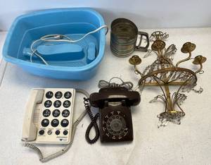 lot 66 image: Primitive Household Items Including Vintage Telephones, Brass And Crystal Wall Candelabra And More