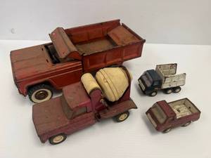 Group Of Well Used Tonkas And One Structo Dump Truck
