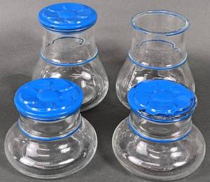 lot 59 image: Vintage Kitchen 4 Poland Enamel Mugs  4 Verreries Du Gier Daisy Glass Storage Jars