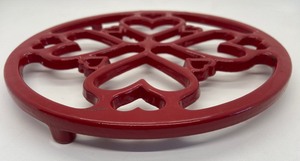 lot 95 image: Vintage Red Cast Iron Enameled Three-Footed Round Trivet with Hearts - Made in France