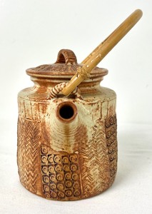 lot 121 image: Earth-Tone Handmade Clay Teapot with Stamped Geometric DesignsBamboo Handle by Nerem