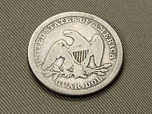 lot 44 image: 1854 ARROWS US SEATED LIBERTY QUARTER