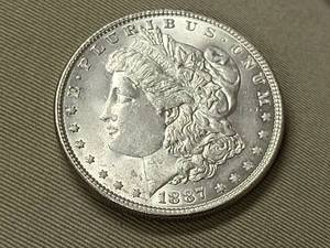 lot 47 image: 1887 MORGAN SILVER DOLLAR BU