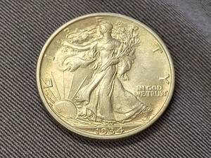 lot 61 image: 1934 WALKING LIBERTY HALF DOLLAR