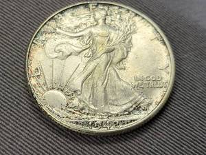 lot 104 image: 1942 WALKING LIBERTY HALF DOLLAR