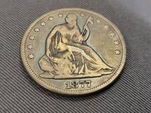 lot 107 image: 1877 US SEATED LIBERTY HALF DOLLAR