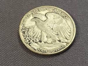 lot 128 image: 1947 WALKING LIBERTY HALF DOLLAR