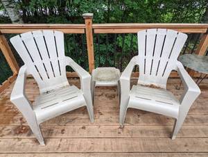 Pair of Plastic Outdoor Chairs and Side Table