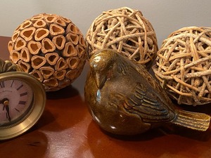 Decorative Home Decor Balls and a Small Decorative Clock
