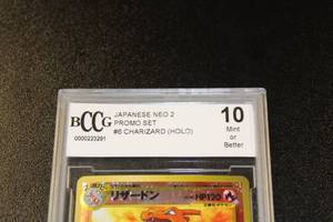 lot 5 image: 2000 Japanese NEO 2 Promo Set Charizard Holo #6 BCCG 10