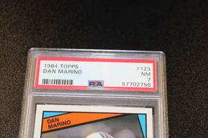 lot 7 image: 1984 Topps Dan Marino #123 Rookie Card PSA 7