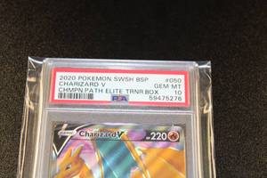 lot 8 image: 2020 SWSH Champions Path ETB Promo Charizard #050 PSA 10