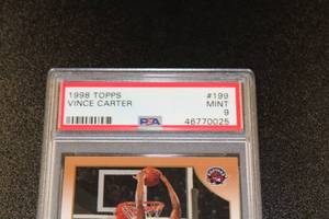 lot 9 image: 1998-99 Topps Vince Carter #199 Rookie Card PSA 9