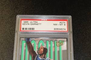 lot 16 image: 1995-96 Fleer Ultra Kevin Garnett #274 Rookie Card PSA 8
