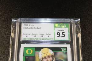 lot 21 image: 2020 Score Justin Herbert #362 Rookie Card CSG 9.5