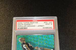 lot 27 image: 2002-03 Topps Pristine Popular Demand Jersey Kevin Garnett #PD-KG PSA 9
