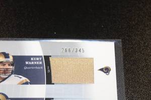 lot 64 image: 2003 SP Authentic Threads Double Jersey Kurt Warner  Torry Holt 266345  Only 345 Exist
