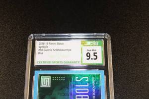 lot 135 image: 2018-19 Panini Status Symbols Blue Giannis Antetokounmpo #18 CSG 9.5