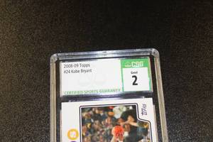lot 136 image: 2008-09 Topps Kobe Bryant w LeBron James #24 CSG 2 Paper loss on back