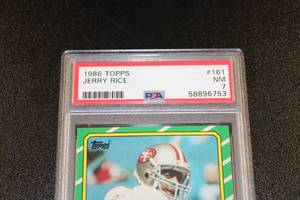 lot 137 image: 1986 Topps Jerry Rice #161 Rookie Card PSA 7