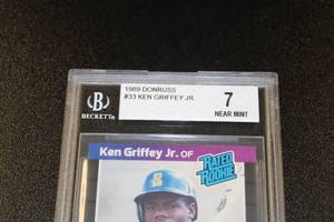 lot 151 image: 1989 Donruss Ken Griffey Jr. #33 Rookie Card BGS 7