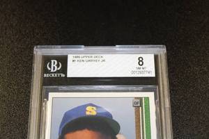 lot 152 image: 1989 Upper Deck Ken Griffey Jr. #1 Rookie Card BGS 8