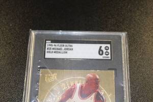 lot 197 image: 1995-96 Fleer Ultra Gold Medallion Michael Jordan #25 SGC 6