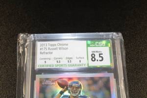 lot 210 image: 2013 Topps Chrome Refractor Russell Wilson #175 CSG 8.5