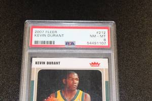 lot 217 image: 2007-08 Fleer Kevin Durant #212 Rookie Card PSA 8