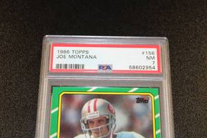 lot 227 image: 1986 Topps Joe Montana #156 PSA 7